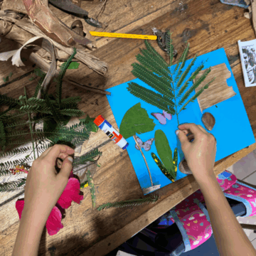 Childrens hands working with plants from their backyard and schoolyard in Cocles, Costa Rica. Eco Art to help children connect with their community and identity.
